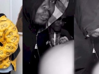 Reactions As Singer Olamide Is Spotted Sipping Drink From A Lady's Backside (Video)