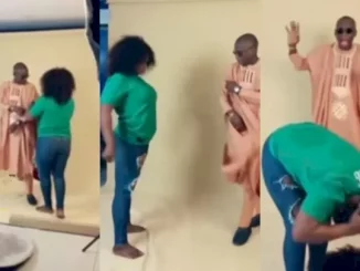 Confusion As Camerawoman Suddenly Goes Into Trance During Photoshoot (Video)