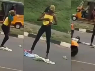Lady runs mad after being dropped by an alleged yahoo boy in middle of a road (Video)